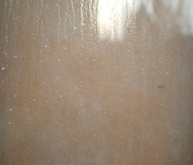 window glass with water drops