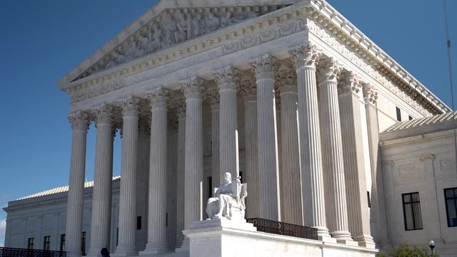 Motion to left of west facade of the Supreme Court building in Washington, DC.
