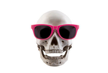 Human skull with pink glasses and open jaw isolated on white background with clipping path