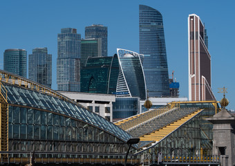 The complex of modern multi-storey buildings and the Moscow City pedestrian bridge