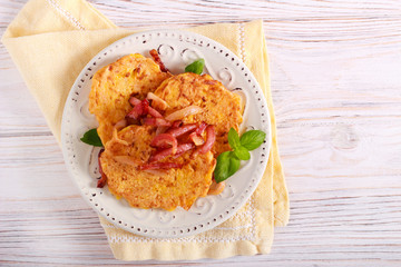 Pumpkin fritters with fried bacon