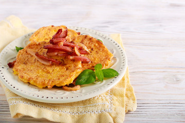 Pumpkin fritters with fried bacon