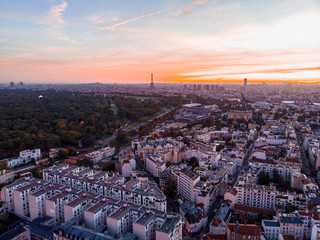 Aerial view of Paris skyline with Eiffel Tower from the Boulogne Forest at rising morning sun