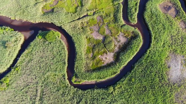 aerial footage of a salt marsh at Sagamore Beach on Cape Cod Massachusetts
