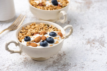 Granola, oatmeal with almond and berry food background