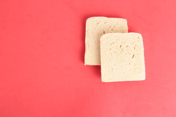 bread without rind in colorful background..