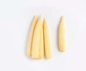 fresh baby corn isolated on white background