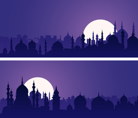 Horizontal banners of eastern city with minarets and domes at night.