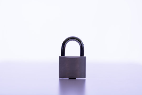 Privacy and data protection: locked padlock with white background