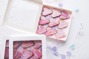 Boxes with cookies in the form of marble hearts for gifts