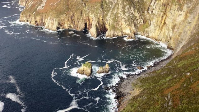 Aerial of Slieve League Cliffs are among the highest sea cliffs in Europe rising 1972 feet or 601 meters above the Atlantic Ocean - County Donegal, Ireland