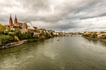 Old city center of Basel with Munster cathedral and the Rhine river in Switzerland