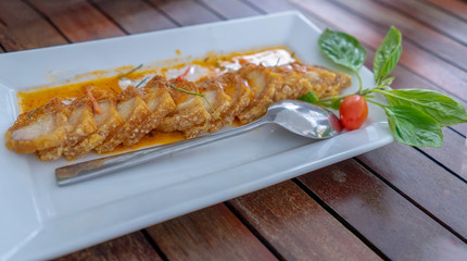 grilled chinese style pork  with tamoto and spicy sauce