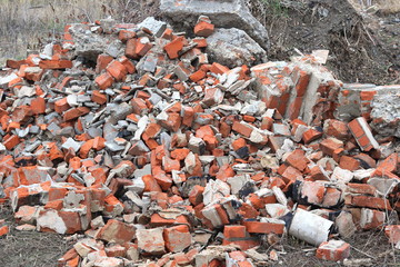 Construction waste with elements of various dismantled and destroyed old structures at municipal...