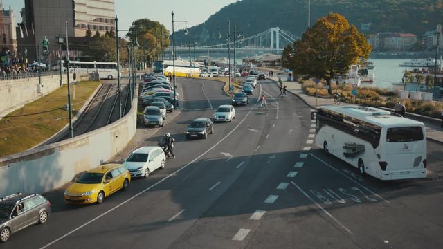 Budapest, Hungary - May 19, 2019: Cars on road traffic surveillance system in highway urban above learning transport machine drive control technology future autonomous city automated street view