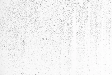 Foto op Aluminium white isolated background water drops on the glass / wet window glass with splashes and drops of water and lime, texture autumn background © kichigin19