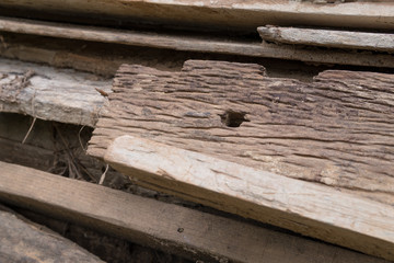Stack of old Wood timbers for construction material