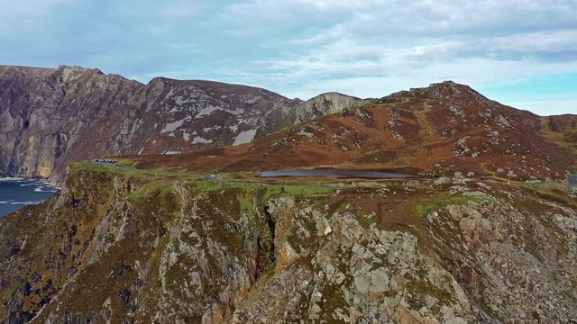 Aerial of Slieve League Cliffs are among the highest sea cliffs in Europe rising 1972 feet or 601 meters above the Atlantic Ocean - County Donegal, Ireland