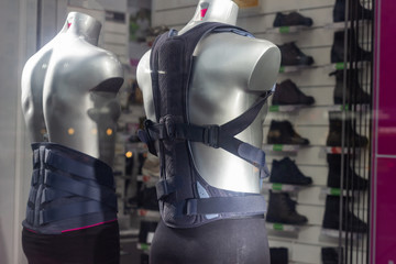 corset for back man.orthopedic shop showcase. healthcare medicine rehabilitation