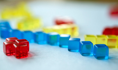 Building blocks illustrating concepts of design, construction, science, medicine, society, economy. Colorful - red, blue, yellow.