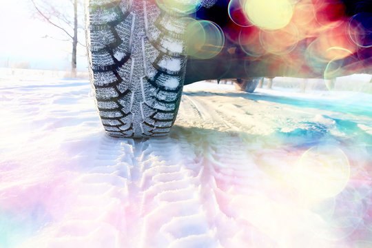 winter tires with spikes on the snow / transport road northern wheels, climate winter season