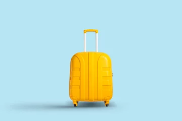 Foto op Plexiglas Gele koffer op een blauwe achtergrond. Reis- en vakantieconcept in triples. Platliggend, bovenaanzicht © Alex