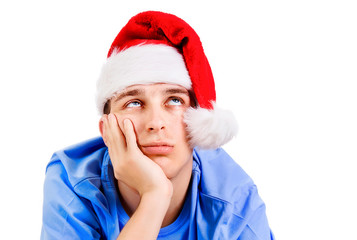 Unhappy Young Man in Santa Hat