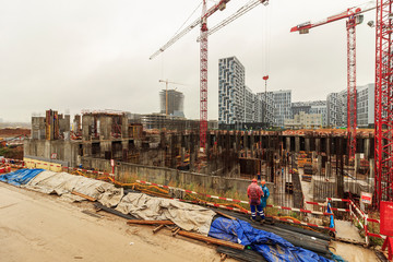 fill base plate. pit formation of grillage is completed. Forms formwork of vertical structures of...