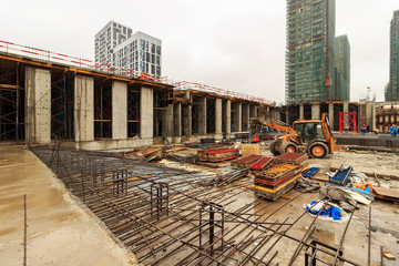 fill base plate. pit formation of grillage is completed. Forms formwork of vertical structures of...