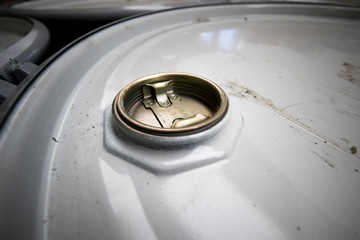 Top of 200 litre 55 US gallon empty gasoline drums in storage area awaiting pick up