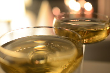 abstract close up champagne glasses blurred dark background