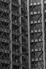 Abstract architecture. Elements of the building are made of glass and metal. Skyscraper. Black and white