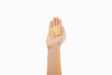 cereal in hand with white background