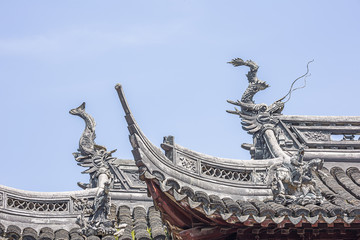 Dragon heads decorating a roof in the Yuyuan Garden in Shanghai