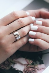 Tender jewerly on female hand, close up shot