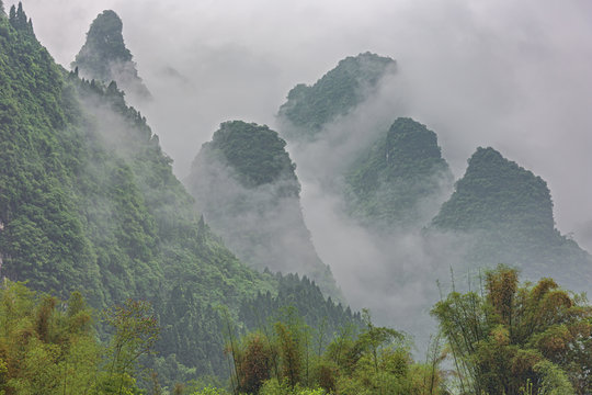 Dense clouds rising along the hills near Yangshuo on the Li River near Guilin
