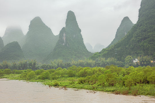 Misty hills at Maozhou island in the vicinity of Lingchuan near Guilin