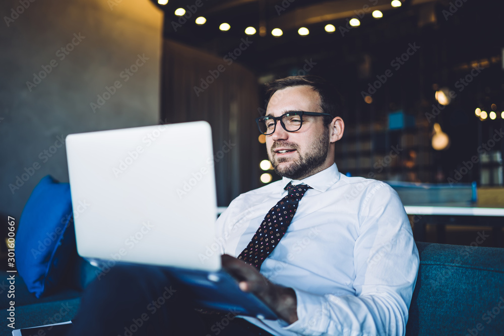 Aufkleber handsome male trader in spectacles for vision correction checking information on financial website c