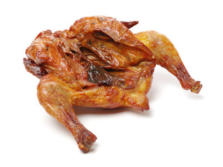 Whole roasted chicken against white background