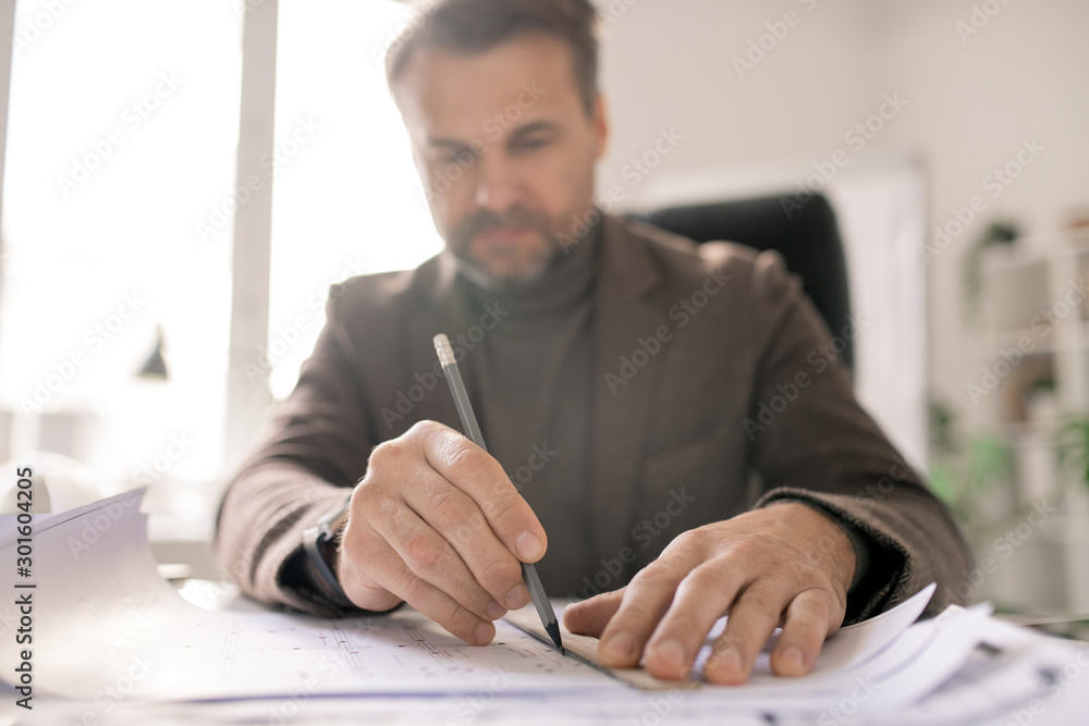 Poster Hands of architect with pencil and ruler drawing line while making sketch