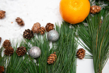 Christmas background. Fir branches and toys.