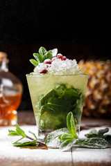 mojito in a glass on a bar counter