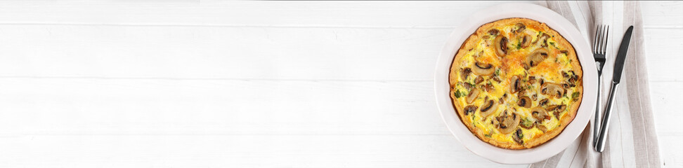 Quiche pie with chicken and mushrooms. Copy space. Banner for the site. The concept of food, breakfast