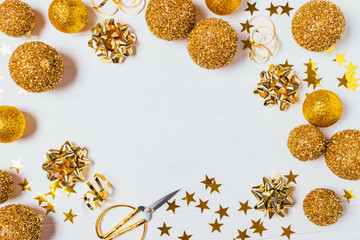 Christmas golden ornaments flat lay