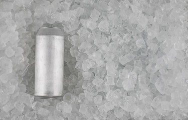 can of beer with cold ice cubes