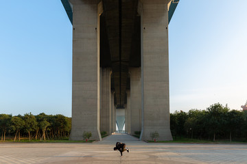 break dance near bridge 