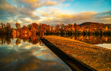 autumn landscape with river and trees