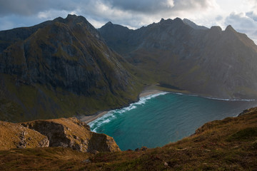 sea water among the Mountains on the beach of Kvalvika view from Mount Ryten in fall  evening