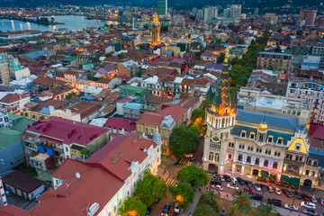 Fototapeta na wymiar Panoramic view of Batumi and Astronomical clock, Georgia. Twilight over the old city and Downtown of Batumi - capital of Adjara, Georgia