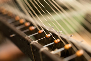 detail of old spinning wheel, yarns